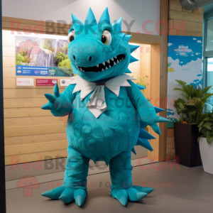 Turquoise Stegosaurus mascot costume character dressed with a Shorts and Ties