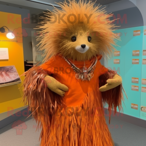 Orange Porcupine mascot costume character dressed with a Wrap Dress and Shawl pins