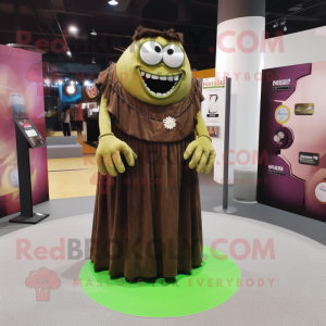 Brown Frankenstein'S Monster mascot costume character dressed with a Maxi Skirt and Lapel pins