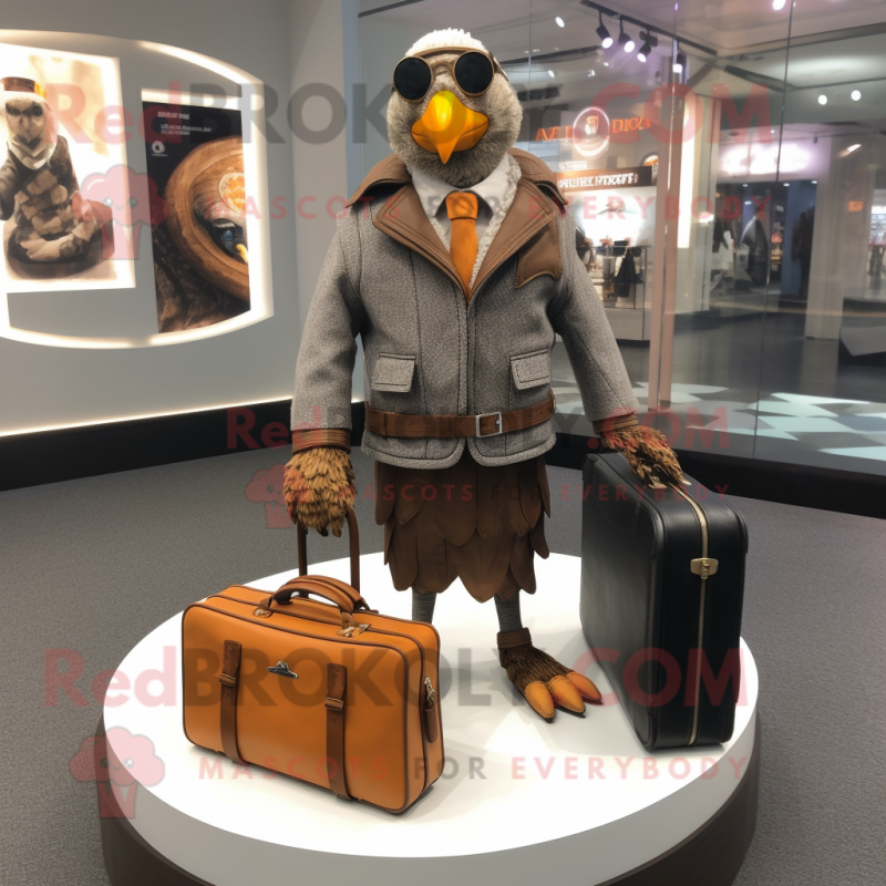 nan Quail mascot costume character dressed with a Leather Jacket and Briefcases