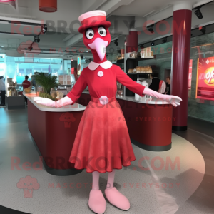 Red Flamingo mascot costume character dressed with a Cocktail Dress and Beanies