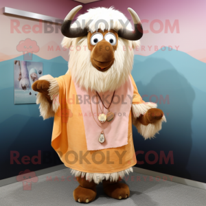 Peach Yak mascot costume character dressed with a Cover-up and Shawl pins