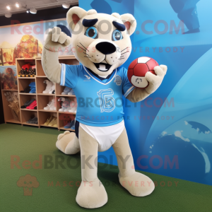 Sky Blue Mountain Lion mascot costume character dressed with a Rugby Shirt and Shoe clips