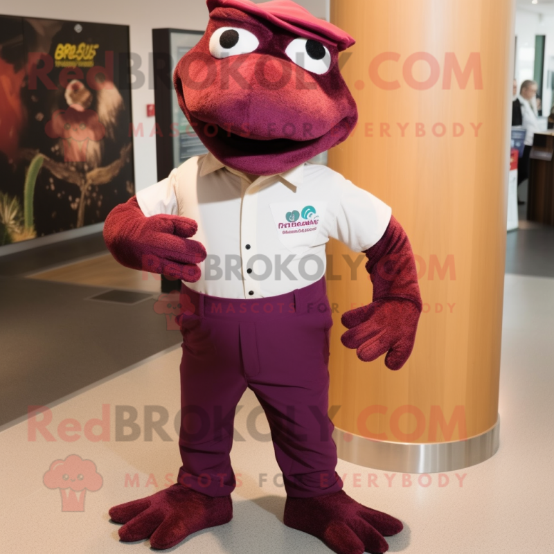 Maroon Lizard mascot costume character dressed with a Trousers and Brooches Maroon Lizard mascot costume character dressed with a Trousers and Brooches