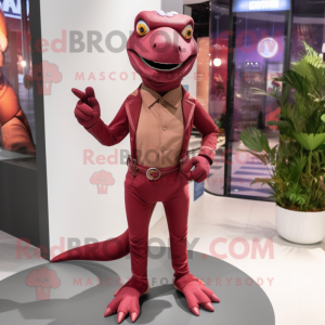 Maroon Lizard mascot costume character dressed with a Trousers and Brooches