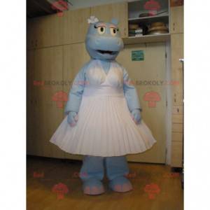 Mascota de hipopótamo azul con un vestido blanco -