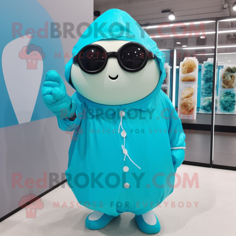 Cyan Potato mascot costume character dressed with a Raincoat and Sunglasses Cyan Potato mascot costume character dressed with a Raincoat and Sunglasses