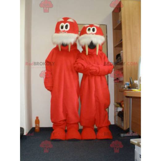 2 mascottes van rode en witte walrussen. 2 walrussen -