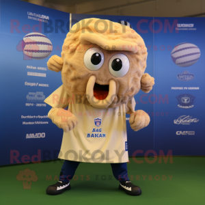 Beige Fried Calamari mascot costume character dressed with a Rugby Shirt and Keychains