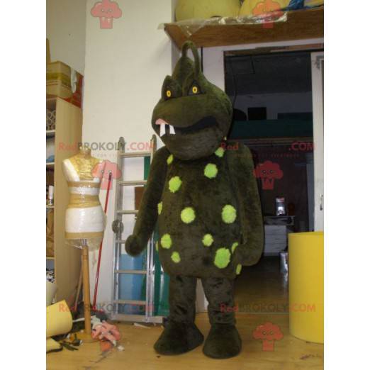 Mascote terrível monstro marrom e verde - Redbrokoly.com