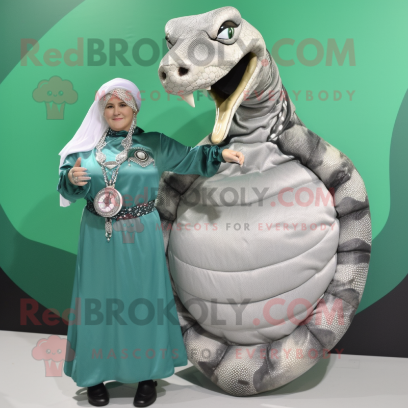 Silver Titanoboa mascot costume character dressed with a Blouse and Bracelet watches