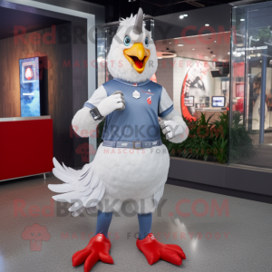 Silver Rooster mascot costume character dressed with a Graphic Tee and Smartwatches