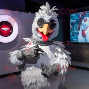 Silver Rooster mascot costume character dressed with a Graphic Tee and Smartwatches