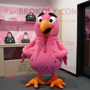 Pink Blackbird mascot costume character dressed with a Sweatshirt and Clutch bags