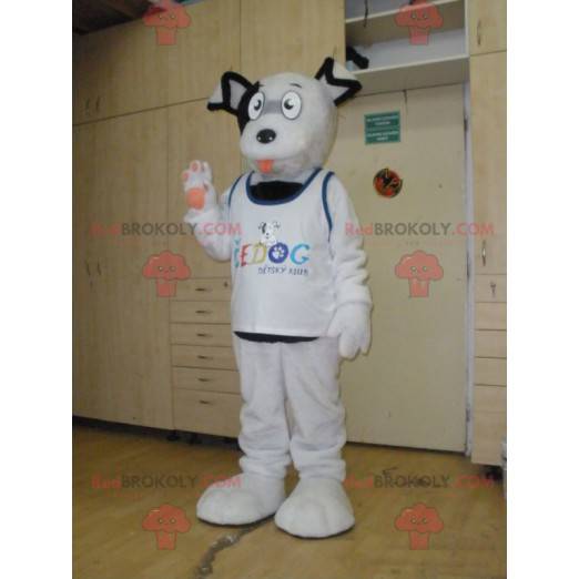 Funny and hairy sweet white and black dog mascot -