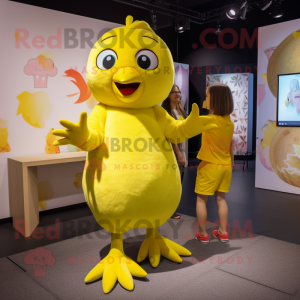 Lemon Yellow Quail mascot costume character dressed with a Playsuit and Watches