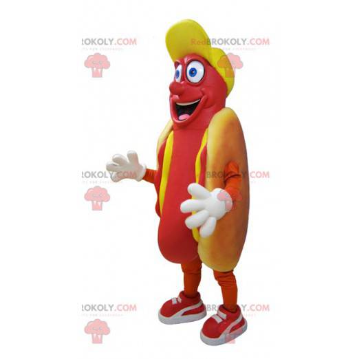 Mascote cachorro-quente gigante ávido e sorridente -