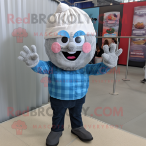 Silver Cupcake mascot costume character dressed with a Denim Shirt and Foot pads