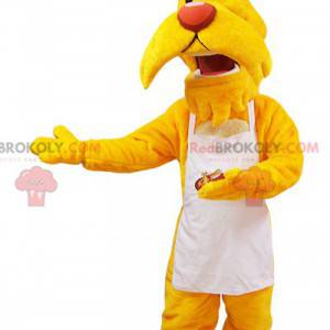 Mustache gul hundemaskott kledd i et hvitt forkle -