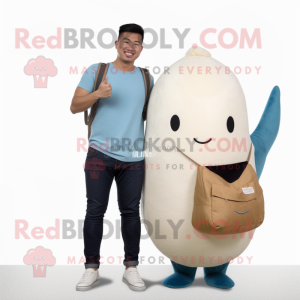 Beige Narwhal mascot costume character dressed with a Boyfriend Jeans and Wallets