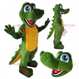 Mascote crocodilo verde e amarelo com olhos azuis -