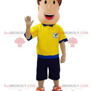 Mascota de árbitro hombre con un traje azul y amarillo -
