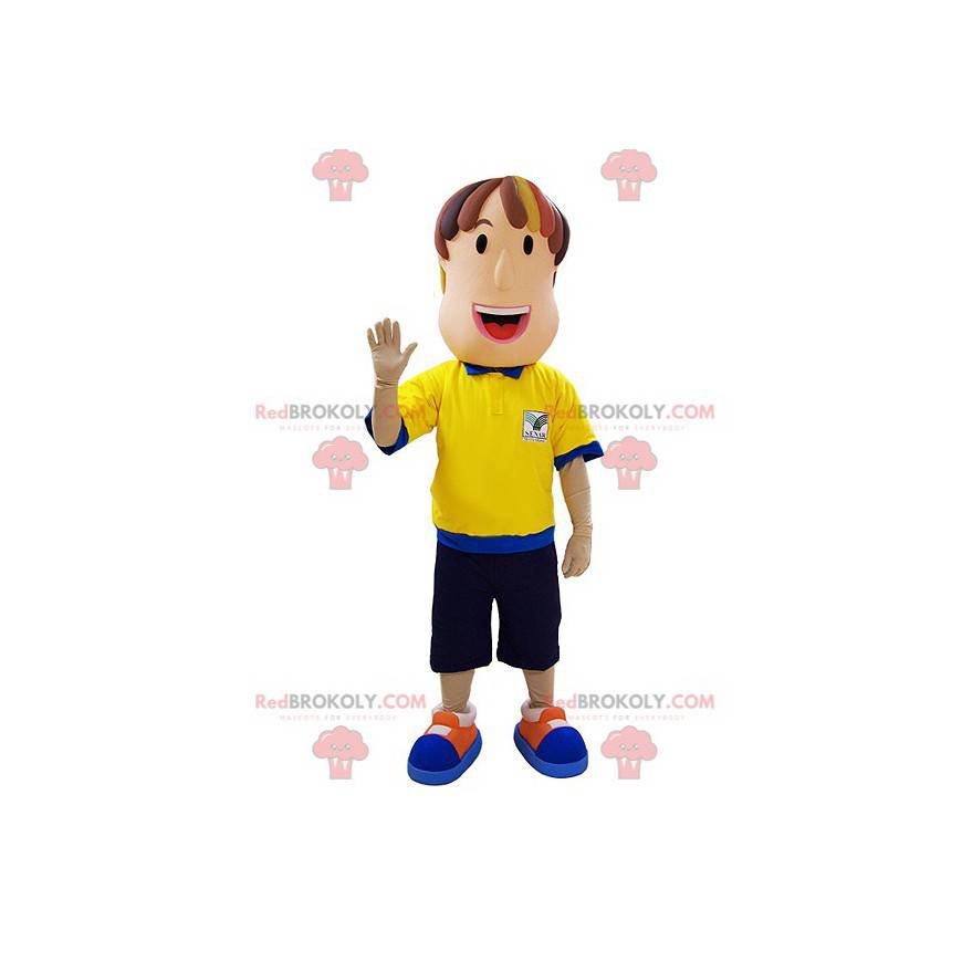 Mascote do árbitro com uma roupa azul e amarela - Redbrokoly.com