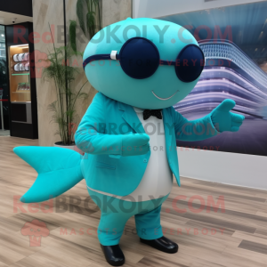 Turquoise Whale mascot costume character dressed with a Suit Pants and Sunglasses