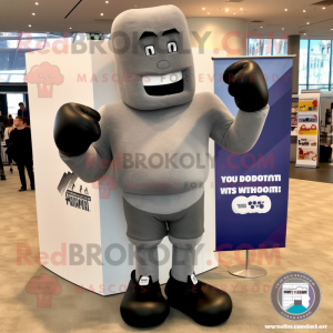 Gray Boxing Glove mascot costume character dressed with a Graphic Tee and Foot pads