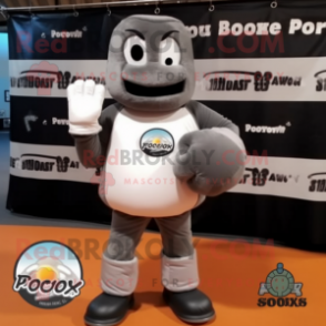 Gray Boxing Glove mascot costume character dressed with a Graphic Tee and Foot pads