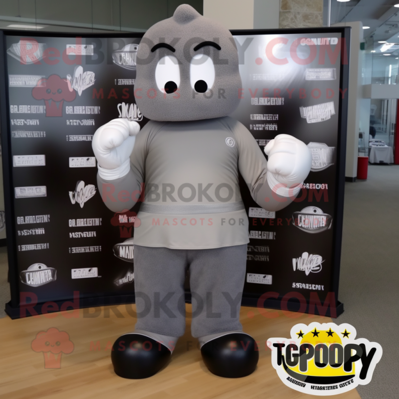 Gray Boxing Glove mascot costume character dressed with a Graphic Tee and Foot pads Gray Boxing Glove mascot costume character dressed with a Graphic Tee and Foot pads