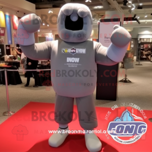 Gray Boxing Glove mascot costume character dressed with a Graphic Tee and Foot pads