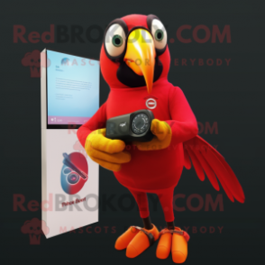 Red Toucan mascot costume character dressed with a Jumpsuit and Smartwatches