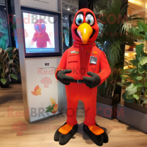 Red Toucan mascot costume character dressed with a Jumpsuit and Smartwatches