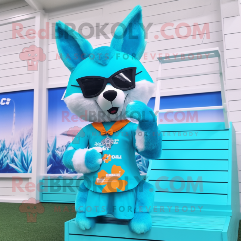 Cyan Fox mascot costume character dressed with a Bikini and Sunglasses Cyan Fox mascot costume character dressed with a Bikini and Sunglasses