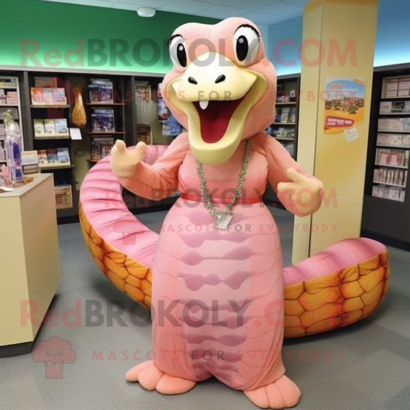 Peach Titanoboa mascot costume character dressed with a Dress and Keychains