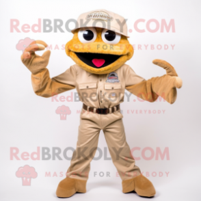 Tan Crab Cakes mascot costume character dressed with a Corduroy Pants and Hat pins