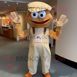 Tan Crab Cakes mascot costume character dressed with a Corduroy Pants and Hat pins