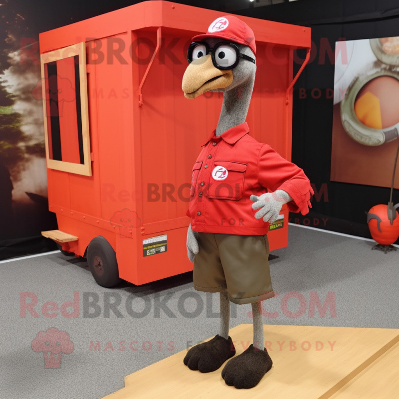 Red Ostrich mascot costume character dressed with a Cargo Shorts and Eyeglasses