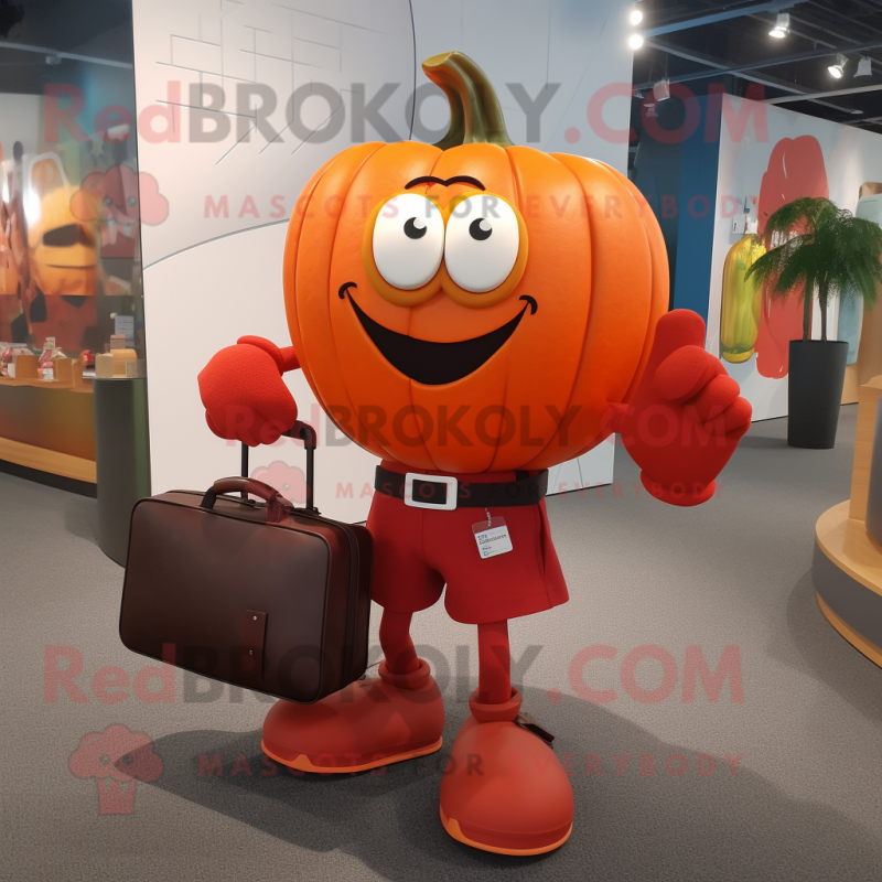 Red Pumpkin mascot costume character dressed with a Henley Tee and Briefcases Red Pumpkin mascot costume character dressed with a Henley Tee and Briefcases