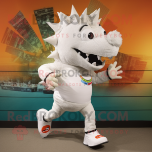 White Stegosaurus mascot costume character dressed with a Running Shorts and Shoe clips