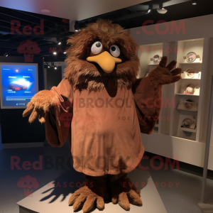 Brown Harpy mascot costume character dressed with a Parka and Mittens