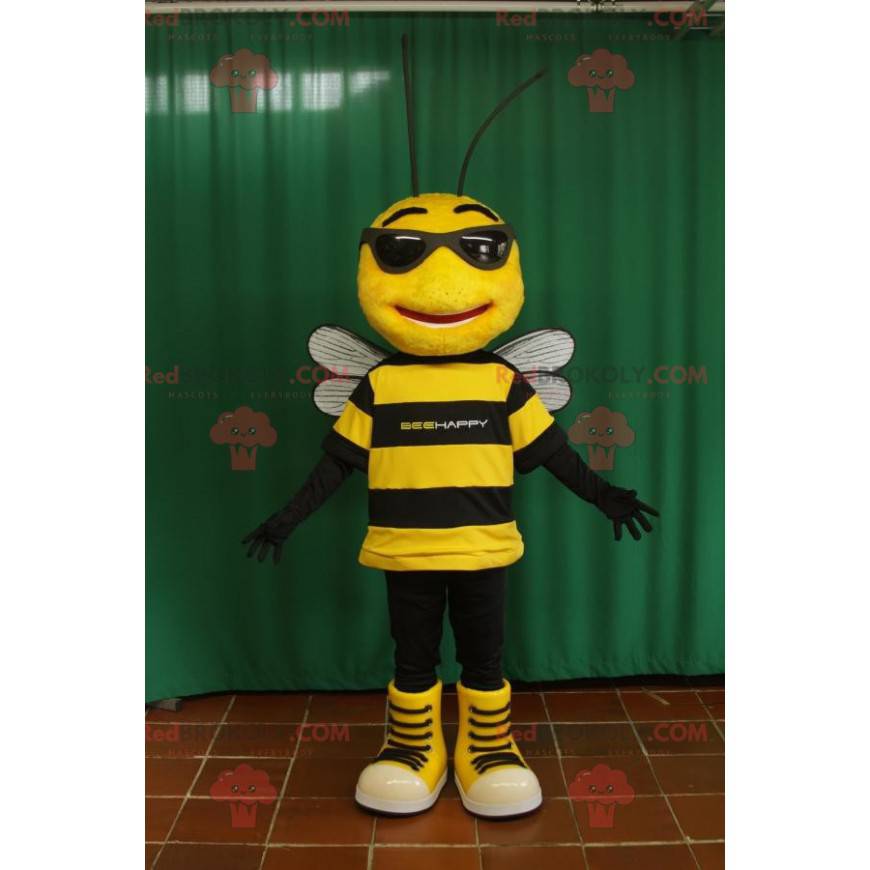 Mascote abelha preta e amarela com óculos de sol -