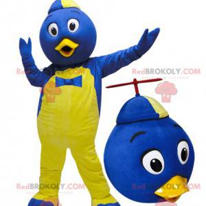 Mascote pássaro azul e amarelo com um chapéu - Redbrokoly.com