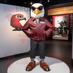 Maroon Falcon mascot costume character dressed with a Moto Jacket and Cufflinks