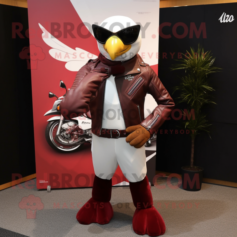 Maroon Falcon mascot costume character dressed with a Moto Jacket and Cufflinks Maroon Falcon mascot costume character dressed with a Moto Jacket and Cufflinks