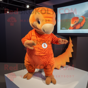 Orange Pangolin mascot costume character dressed with a Long Sleeve Tee and Watches