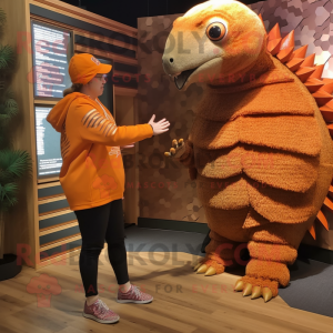 Orange Pangolin mascot costume character dressed with a Long Sleeve Tee and Watches