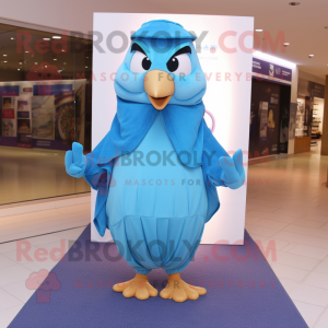 Blue Quail mascot costume character dressed with a Cover-up and Caps