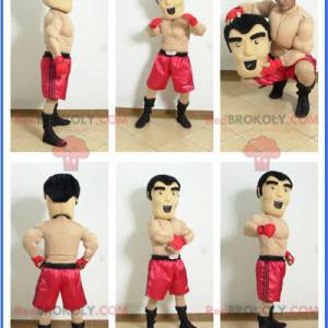 Mascote boxeador sem camisa com shorts vermelhos -